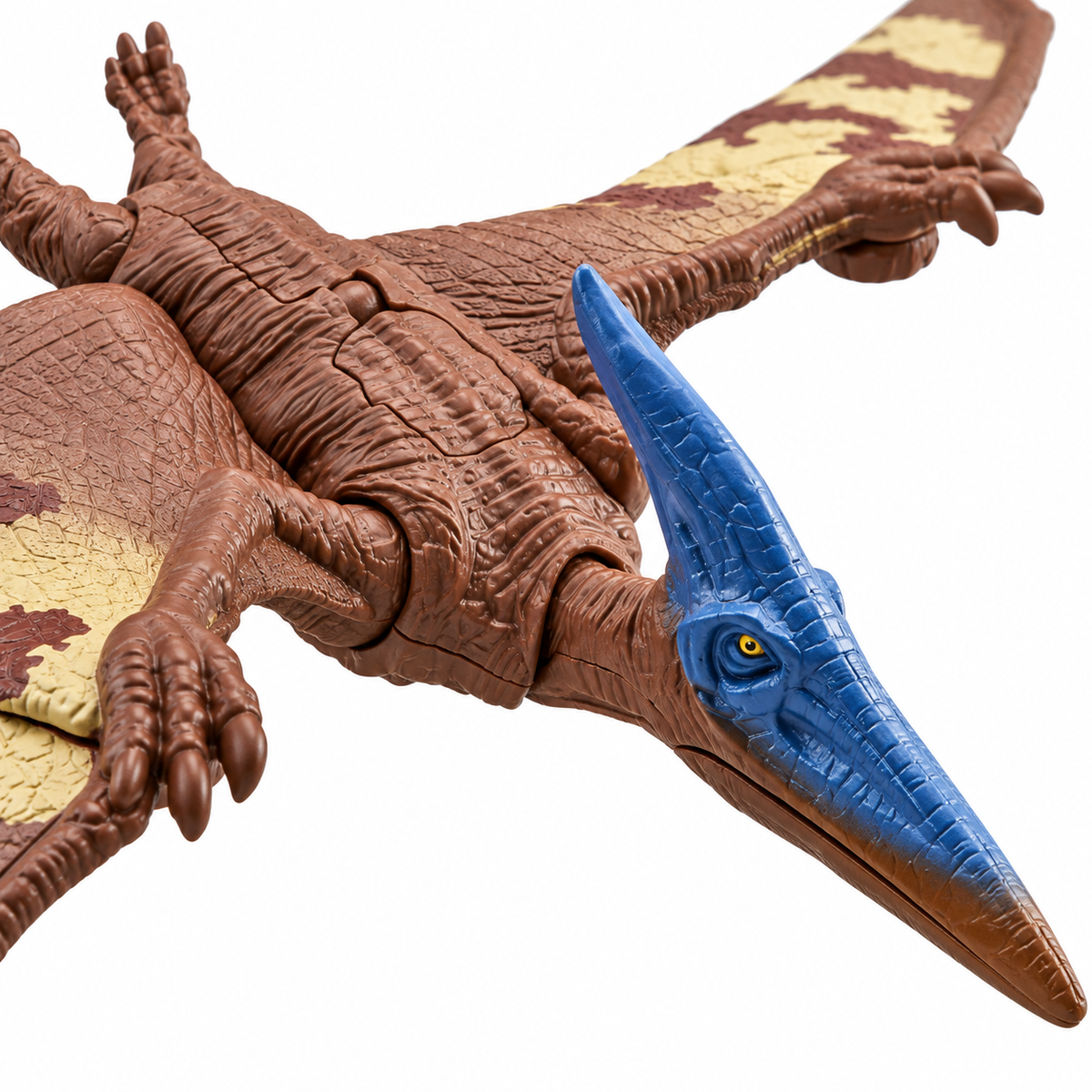 Image d'ambiance non contractuelle : gros plan sur la tête et les ailes de la figurine Ptéranodon