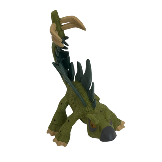 Figurine Dinosaure Stegosaurus en PVC vert avec des détails réalistes et une posture dynamique